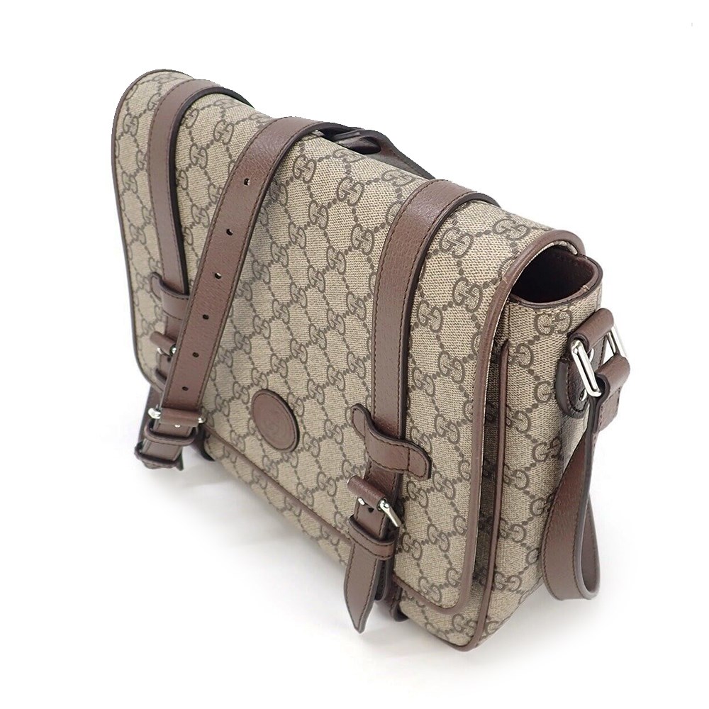 【GUCCI 古馳】 658542 經典GG Supreme印花帆布中性款郵差包 肩背/斜背包(棕色)