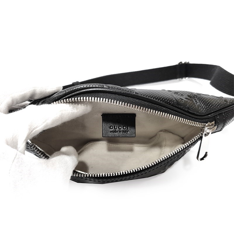 【GUCCI 古馳】658582 經典GG LOGO浮雕皮革中性款腰包/胸包 (黑色80CM)